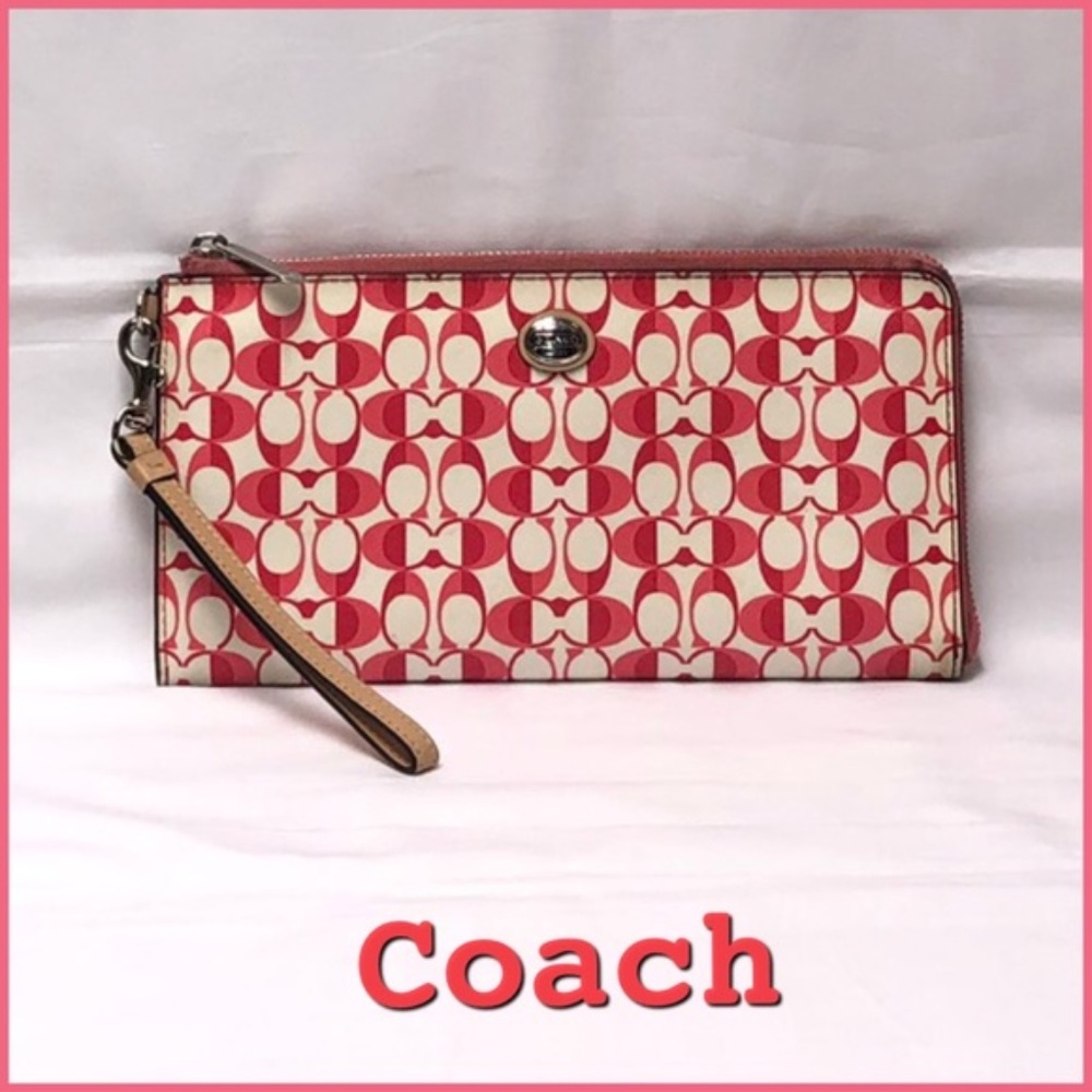 Coach pink/coral/cream wristlet